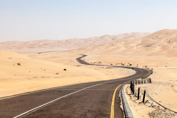 istock Desert road in Abu Dhabi, UAE 671815932