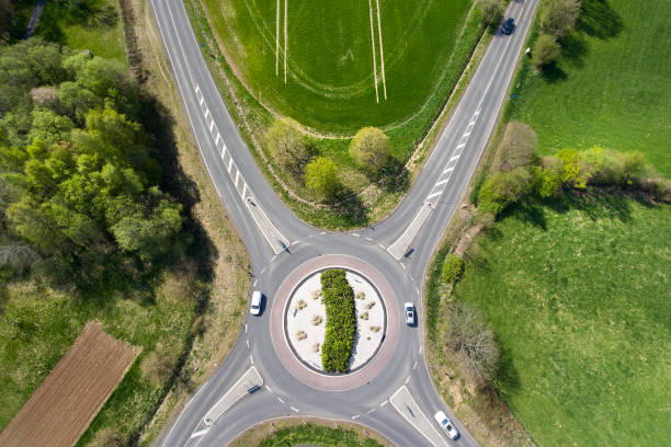 istock Traffic circle, roundabout - aerial view 671818692