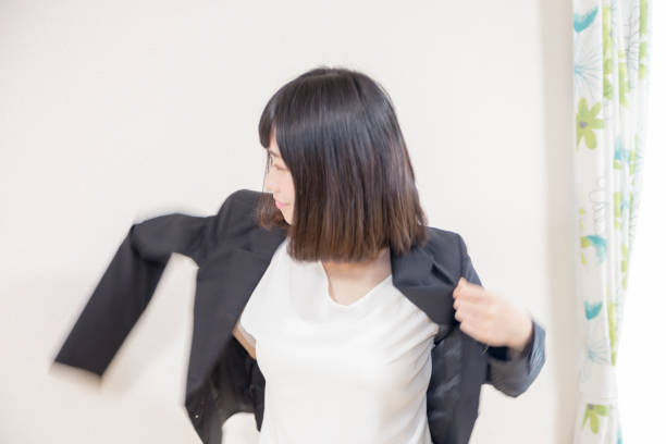 istock Young woman wearing suit 671822938
