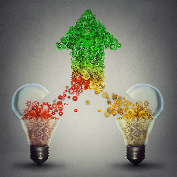 Creative innovation success as two open glass light bulbs releasing gears cogs coming together in the shape of upward arrow symbol
