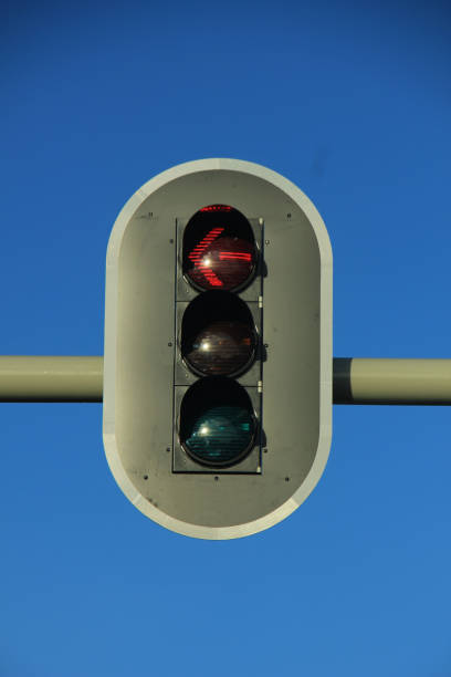 istock Traffic lights in a clear blue sky 671842434