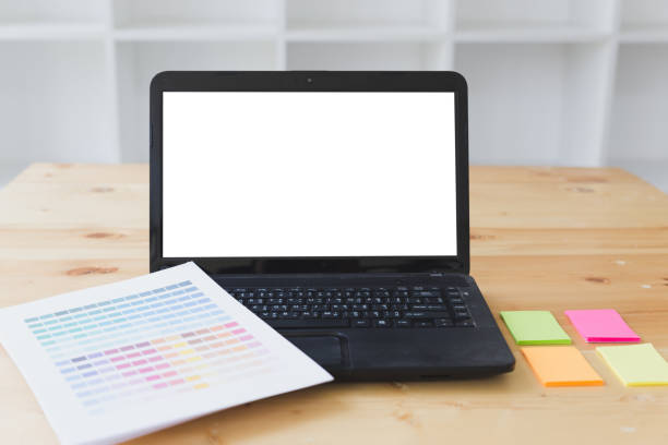 istock graphic designer desk table with computer, sticky note and color guide palette swatches 671842992
