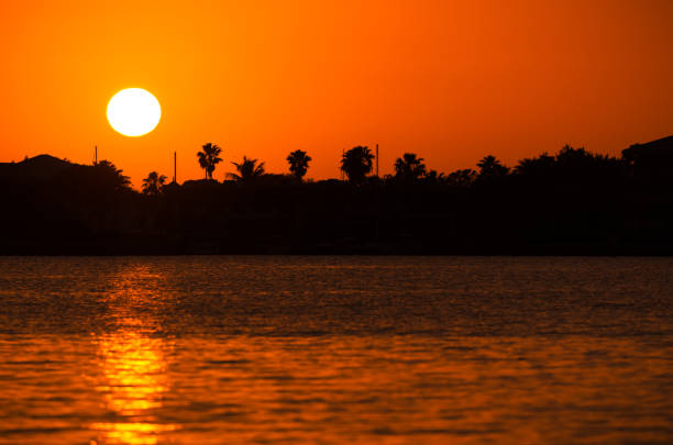 Orange silhouette sunset background in the Indian River Lagoon