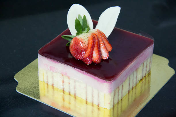 istock Red strawberry mousse cake for birthday 671858482