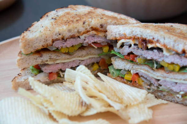istock sandwich closeup with  tomatoes chip potato 671866638