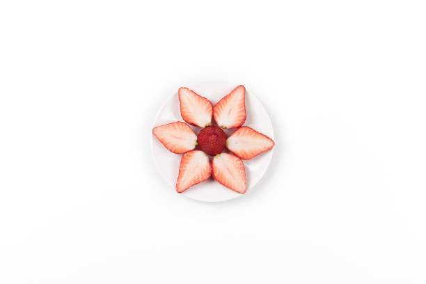 istock High angle view on Japanese strawberries on white background. 671870396
