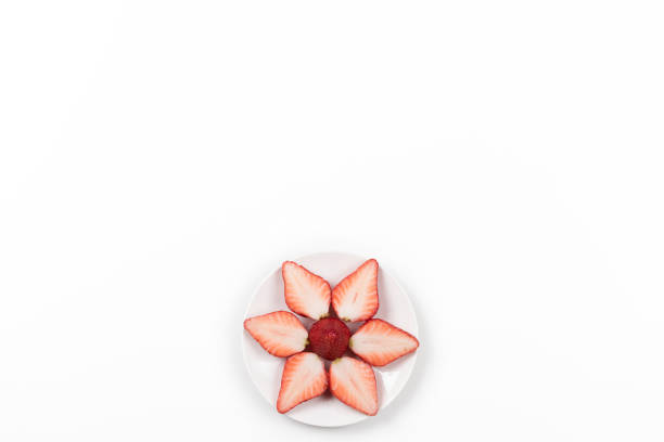 istock High angle view on Japanese strawberries on white background. 671870404