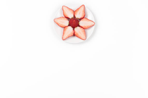 istock High angle view on Japanese strawberries on white background. 671870432