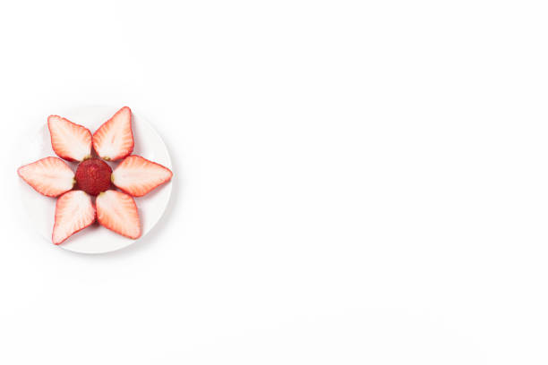 istock High angle view on Japanese strawberries on white background. 671870440