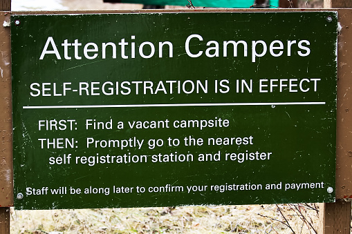 Camping self registration instructions sign.