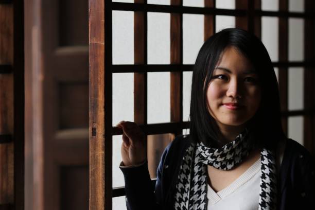 istock Young Japanese lady at Japanese temple 671880334