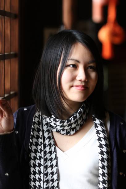 istock Young Japanese lady at Japanese temple 671880394