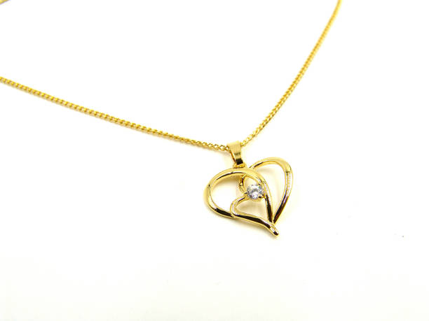 istock Gold necklace with heart pendant 671882660