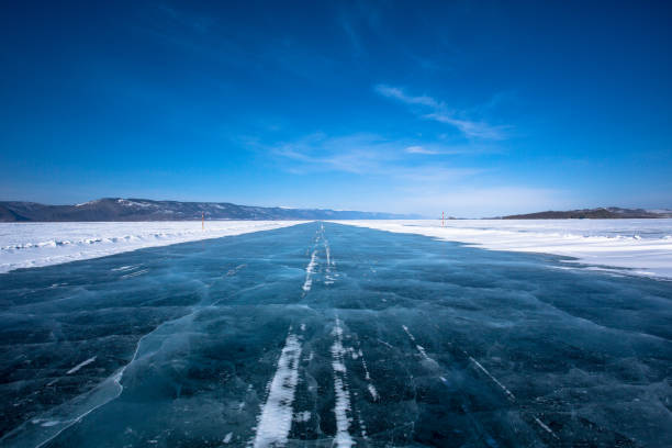 istock Ice Sheet Road On The Lake Baikal 671883484