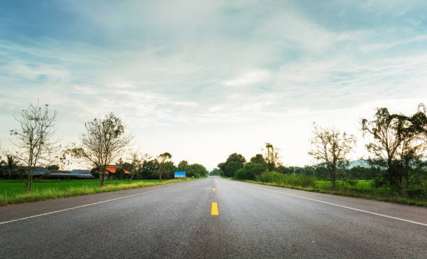 istock Empty road heading to the attraction in Thailand 671885990