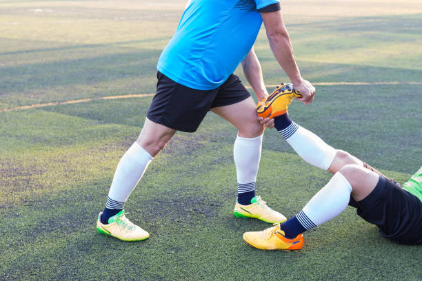 istock Soccer Player  Muscle Cramp On Field 671886504