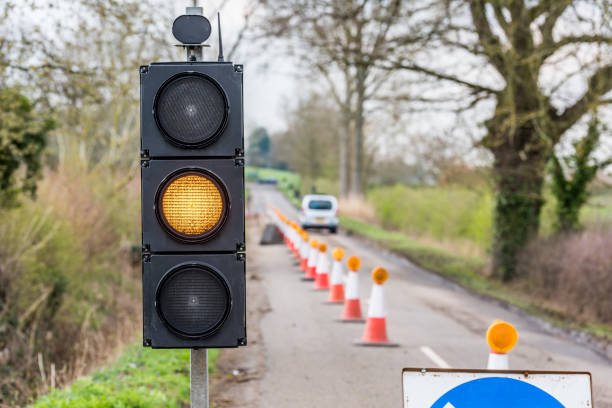 istock UK Motorway Roadworks Yellow Traffic Lights Cones 671908960