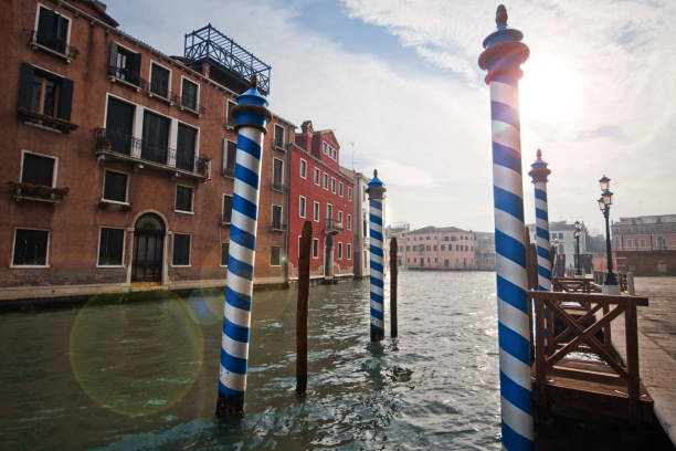 Channels and streets of Venice. Gondolas on the canals of Venice. Venetian architecture. Bridges over the canals.