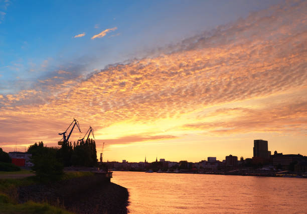 istock Hamburg Harbor in the sunset in Germany 671910130