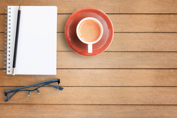 istock Office desk of cup of coffee 671910188