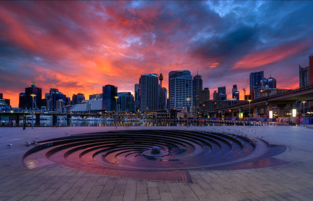 Sunrise of Darling Harbour SYDNEY AUSTRALIA - April 22, 2017: Sunrise of Darling Harbour, adjacent to the city center of Sydney and also a recreational place in Sydney central business district gloriole stock pictures, royalty-free photos & images