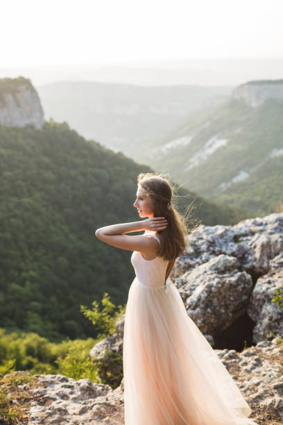 istock Bride portrait with a mountain view 671919116