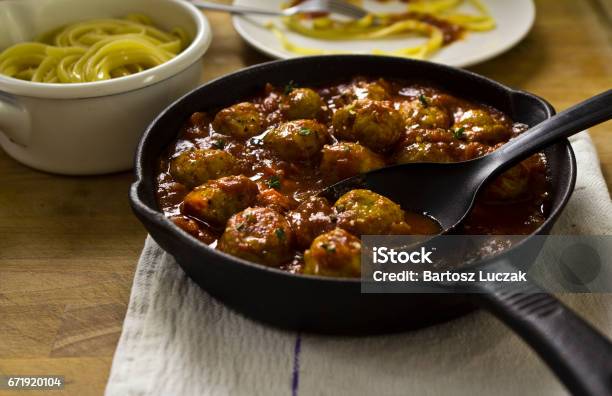 Pan Of Meatballs In Tomato Sauce Served With Spaghetti Stock Photo - Download Image Now