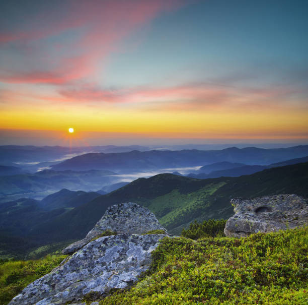 istock Grass and stone on the mountain hill during sundown. Beautiful summer landscape 671935578