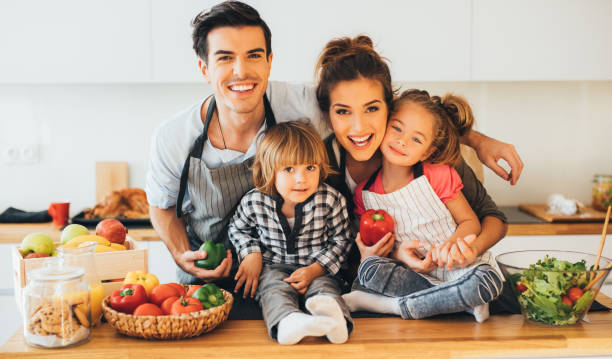 istock Happy family in the kitchen 671935868