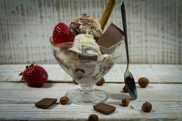 istock Ice Cream in a bowl on wooden background 671938962