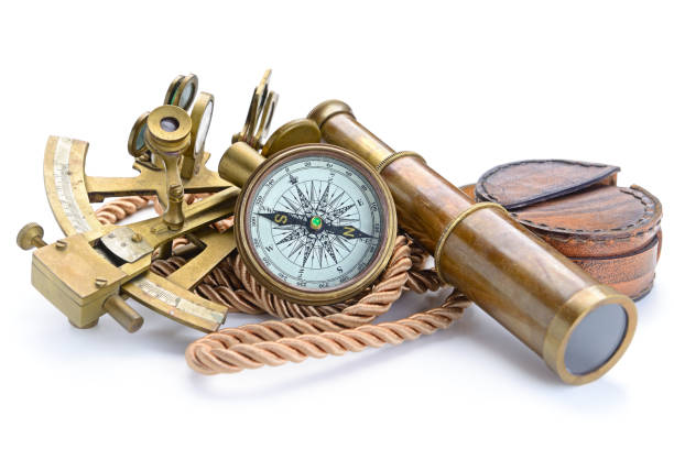 istock compass,sextant and spyglass on the white 671941942