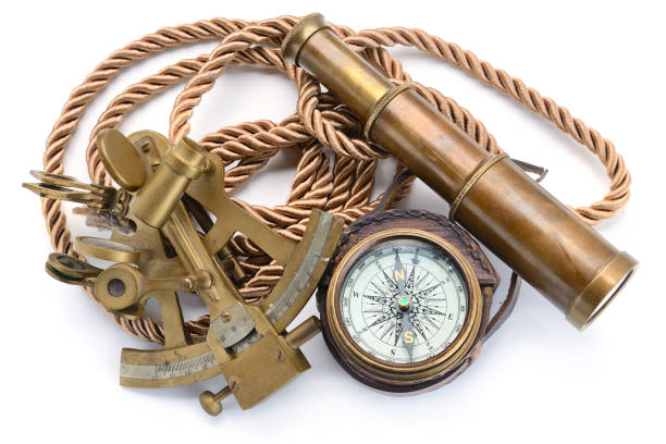 istock compass,sextant and spyglass on the white 671941948