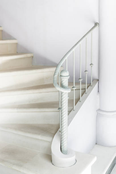 istock White stairs with vintage white railing. Bright and minimalistic  interior 671947870