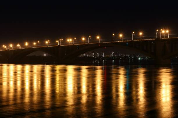 istock Night lights city bridge 671952598