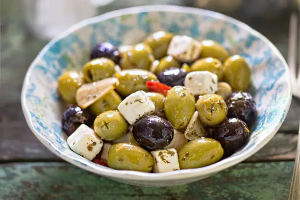 Black green olives with soft cheese