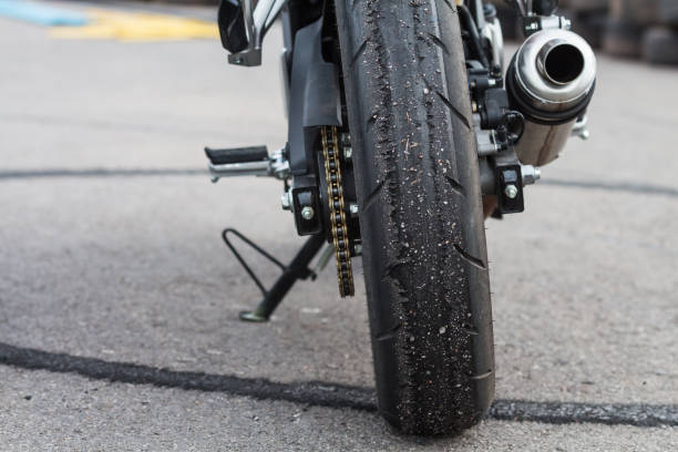 istock Patterned of wheel racing motorcycle on the road. 671965026