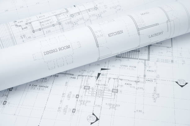istock architectural drawing paper rolls of a dwelling for construction 671965080