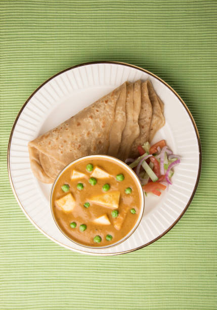 istock Paneer butter masala with chapati / roti / paratha 671965682