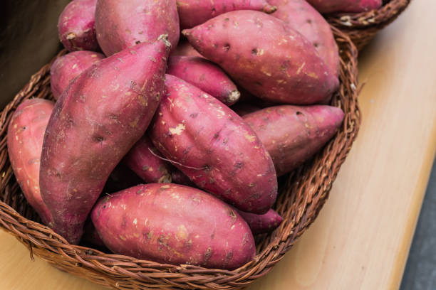 istock group of sweet potato in basket 671974962