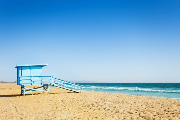 istock Lifeguard tower on a sandy beach of Santa Monica 671982132