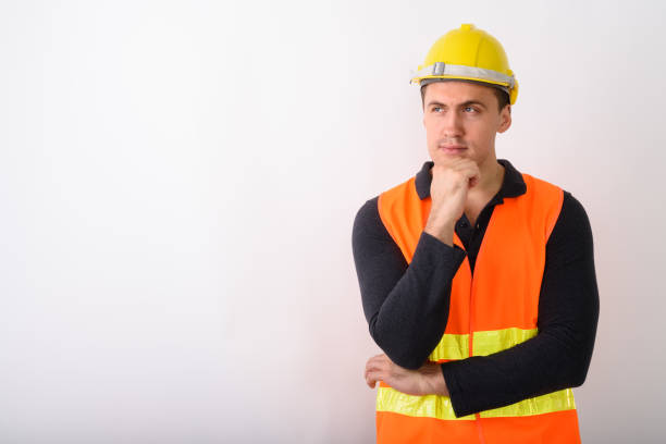 istock Studio shot of young muscular man construction worker thinking against white background 672002008