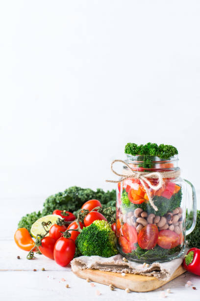 istock Healthy vegan salad in a mason jar with beans 672002998