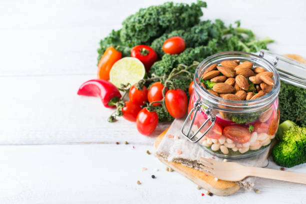istock Healthy vegan salad in a mason jar with beans 672007638