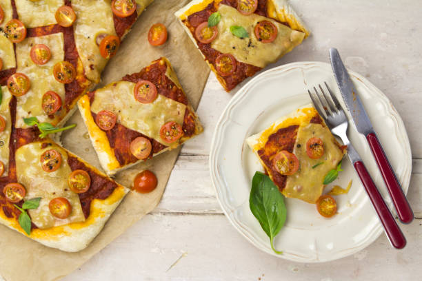 istock Margarita pizza on wooden table 672011764