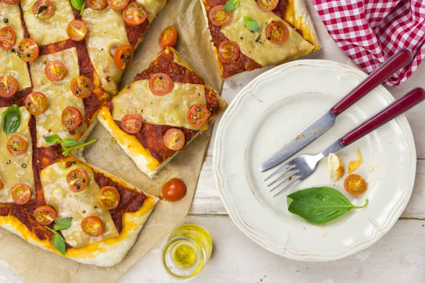 istock Margarita pizza on wooden table 672011802