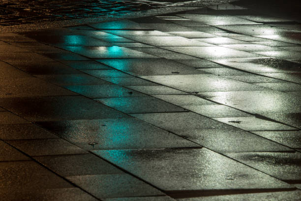 istock City reflection of lights in the rain 672011958