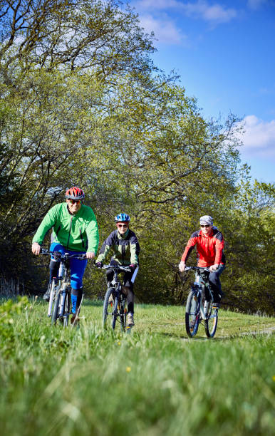 istock Walking a bike through the forest in the spring. 672016290