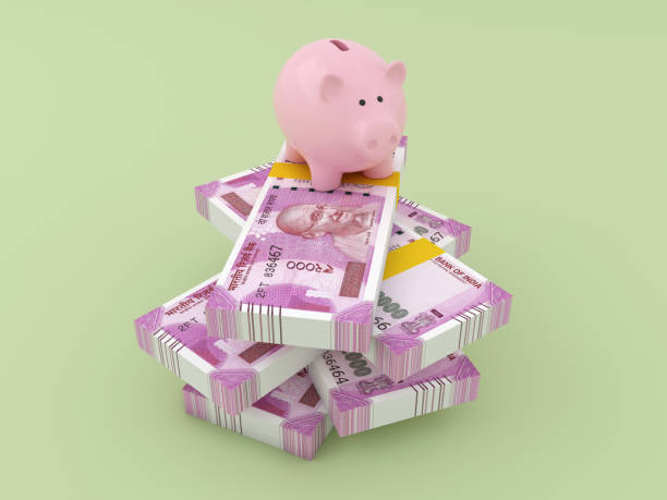 istock New Indian Currency with Piggy Bank 672016346