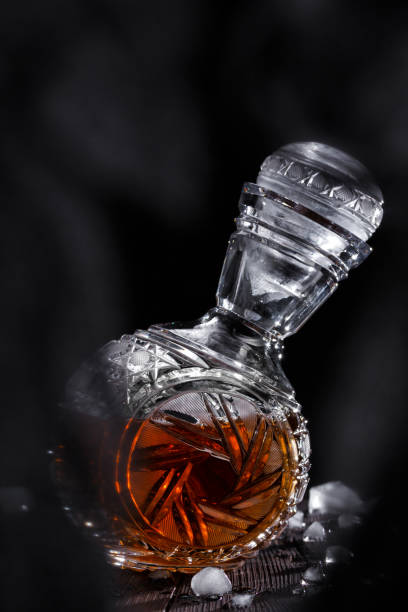 istock Crystal decanter full of strong alcoholic drink 672019524