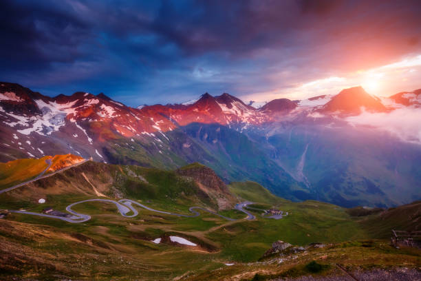 Famous resort Grossglockner High Alpine Road, Austria. Europe. A great view of the hills glowing by sunlight at twilight. Dramatic and picturesque morning scene. Location famous Grossglockner High Alpine Road, Austria. Europe. Artistic picture. Beauty world. grossglockner stock pictures, royalty-free photos & images